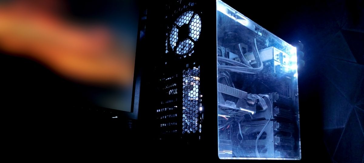 A product photo of a gaming PC tower showing the inside components
