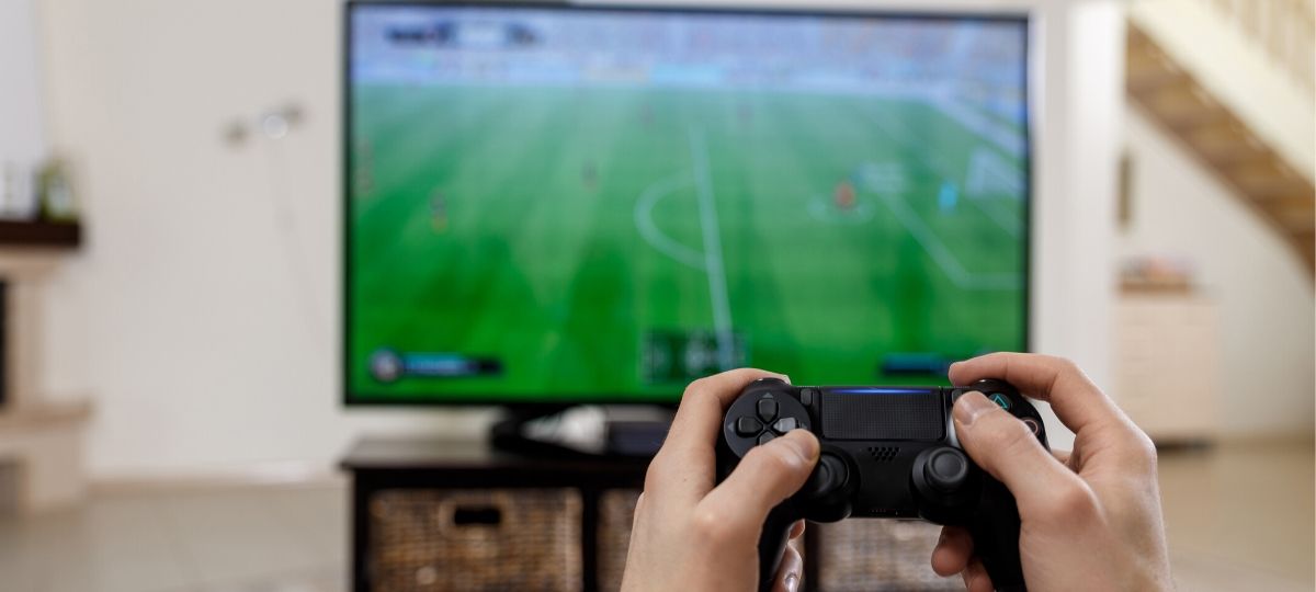 A pov photo of someone playing video games on their tv