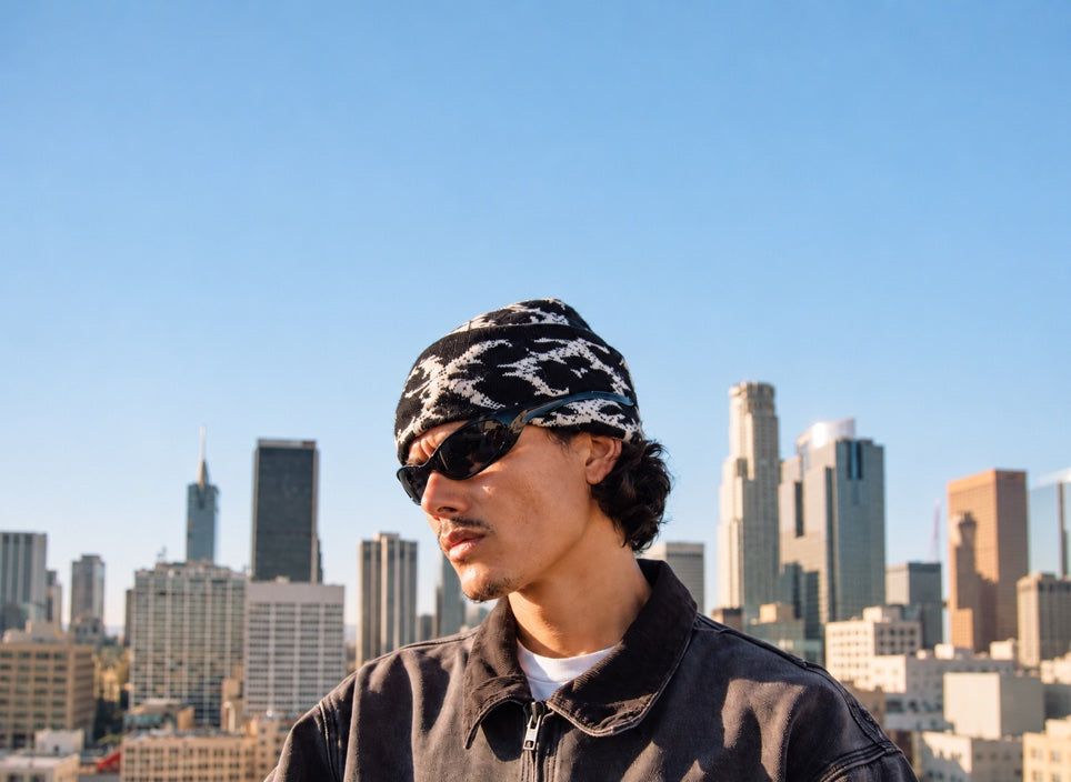 Trevor Colden signature eyewear with open sky above for coming soon announcement