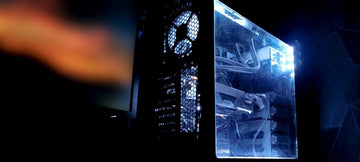 A product photo of a gaming PC tower showing the inside components